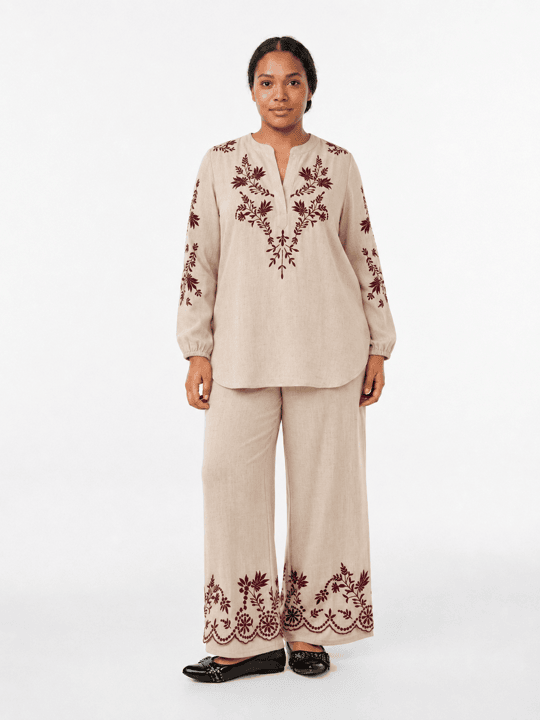Model wearing a bone linen set after virtual try-on